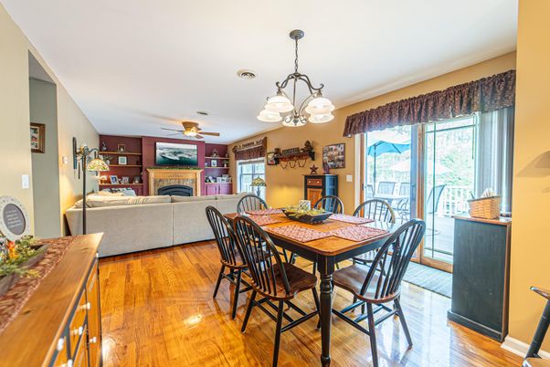 Chandelier, Dining room, Fireplace, Interior, Living room, Wood Texture Flooring