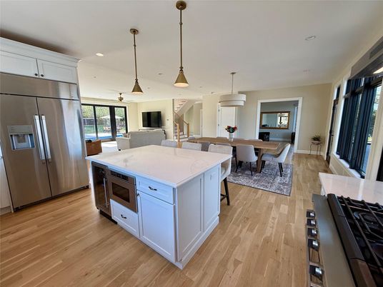 Dining room, Interior, Kitchen, Living room, Pendant Lights, Recessed Lighting, Stainless Steel Appliances, Wood Texture Flooring
