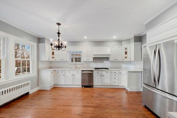Chandelier, Interior, Kitchen, Recessed Lighting, Stainless Steel Appliances, Wood Texture Flooring