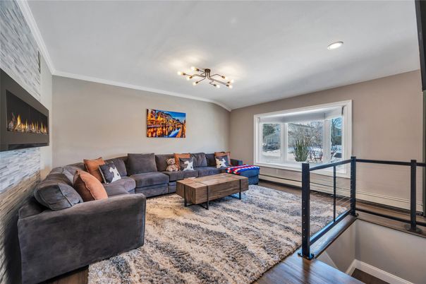 Fireplace, Interior, Living room, Recessed Lighting, Wood Texture Flooring