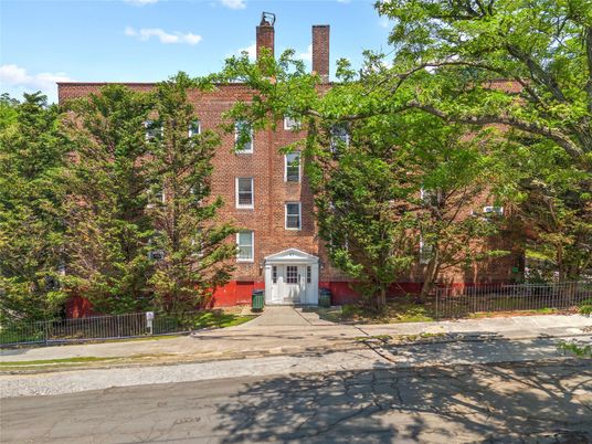 Exterior, Facade, Brick Facade, Condo Building