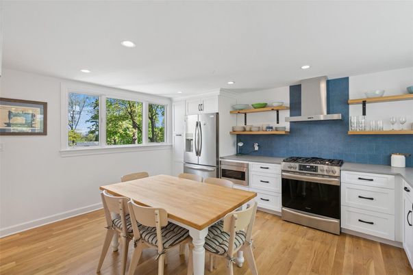 Dining room, Interior, Kitchen, Recessed Lighting, Stainless Steel Appliances, Wood Texture Flooring