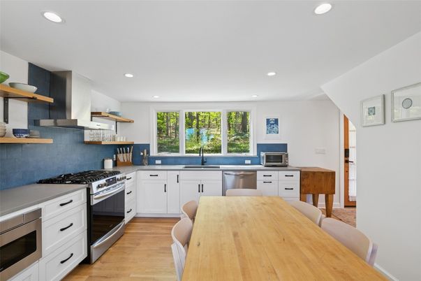 Dining room, Interior, Kitchen, Recessed Lighting, Stainless Steel Appliances, Wood Texture Flooring