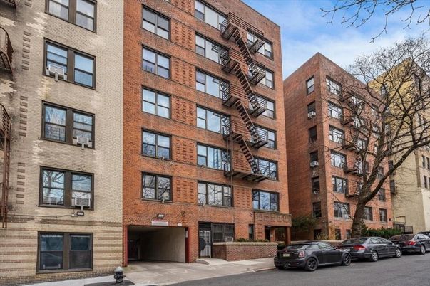 Exterior, Facade, Brick Facade, Condo Building