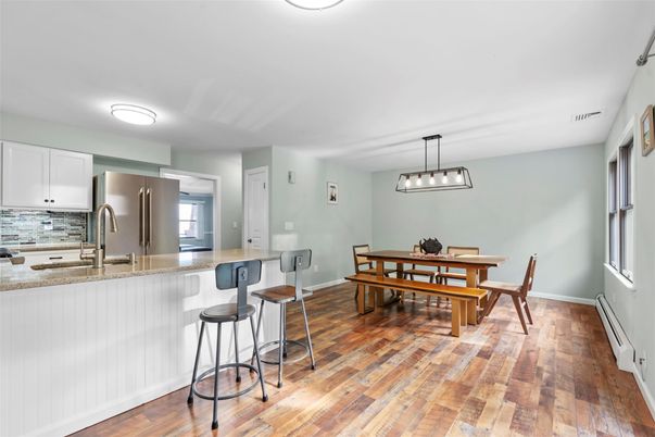 Dining room, Interior, Kitchen, Pendant Lights, Stainless Steel Appliances, Wood Texture Flooring
