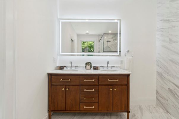 Bathroom, Dual Sink Vanities, Interior, Marble, Marble Walls, Recessed Lighting