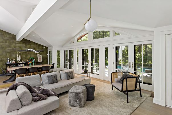 Dining room, Interior, Living room, Pendant Lights, Recessed Lighting, Stone Walls, Wood Texture Flooring