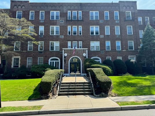 Exterior, Facade, Brick Facade, Condo Building