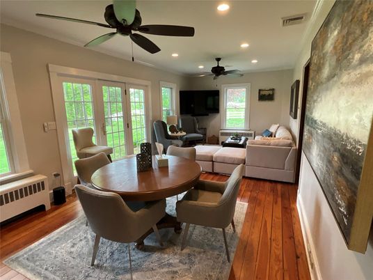 Dining room, Interior, Living room, Recessed Lighting, Stone Walls, Wood Texture Flooring