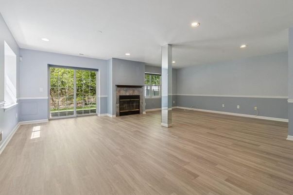 Empty room, Fireplace, Interior, Recessed Lighting, Wood Texture Flooring