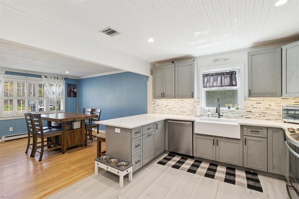 Dining room, Interior, Kitchen, Recessed Lighting, Stainless Steel Appliances, Wood Texture Flooring