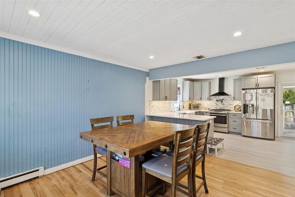 Dining room, Interior, Kitchen, Recessed Lighting, Stainless Steel Appliances, Wood Texture Flooring