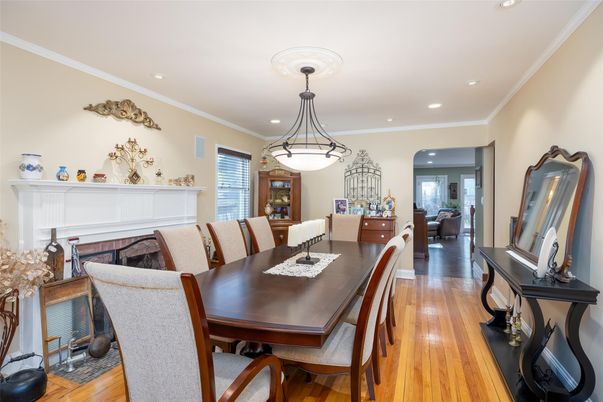 Dining room, Fireplace, Interior, Living room, Pendant Lights, Recessed Lighting, Wood Texture Flooring