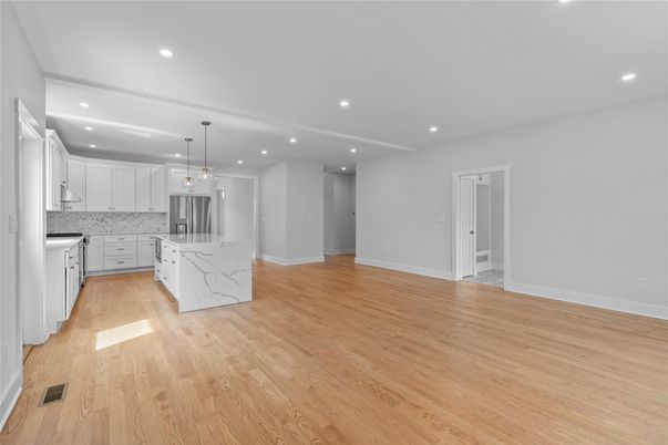 Interior, Kitchen, Marble Walls, Pendant Lights, Recessed Lighting, Stainless Steel Appliances, Wood Texture Flooring