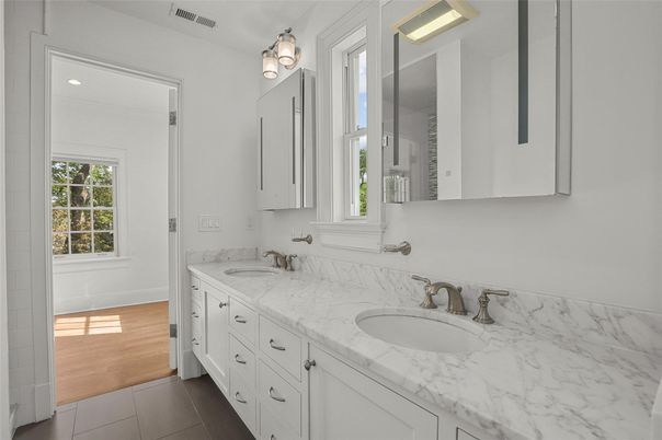 Bathroom, Dual Sink Vanities, Interior, Recessed Lighting, Wood Texture Flooring