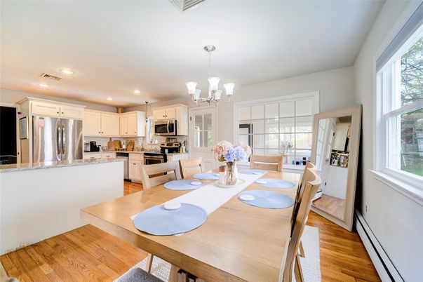 Chandelier, Dining room, Interior, Kitchen, Pendant Lights, Recessed Lighting, Stainless Steel Appliances, Wood Texture Flooring
