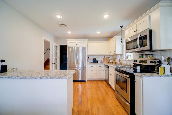 Interior, Kitchen, Pendant Lights, Recessed Lighting, Stainless Steel Appliances, Wood Texture Flooring