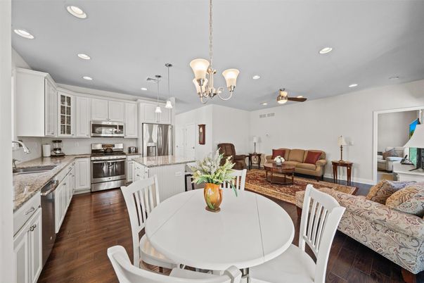 Dining room, Interior, Kitchen, Living room, Pendant Lights, Recessed Lighting, Stainless Steel Appliances, Wood Texture Flooring