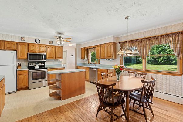 Dining room, Interior, Kitchen, Pendant Lights, Stainless Steel Appliances, Wood Texture Flooring