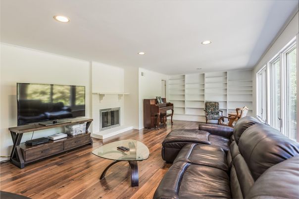Fireplace, Interior, Living room, Piano, Recessed Lighting, Wood Texture Flooring