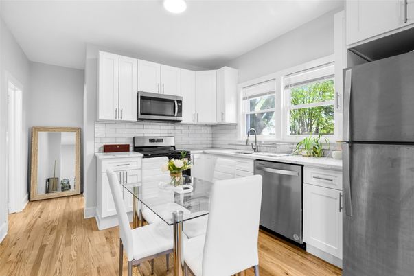Dining room, Interior, Kitchen, Recessed Lighting, Stainless Steel Appliances, Wood Texture Flooring