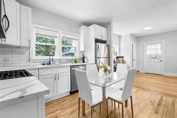 Dining room, Interior, Kitchen, Recessed Lighting, Stainless Steel Appliances, Wood Texture Flooring