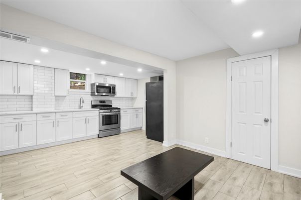 Interior, Kitchen, Recessed Lighting, Stainless Steel Appliances, Wood Texture Flooring
