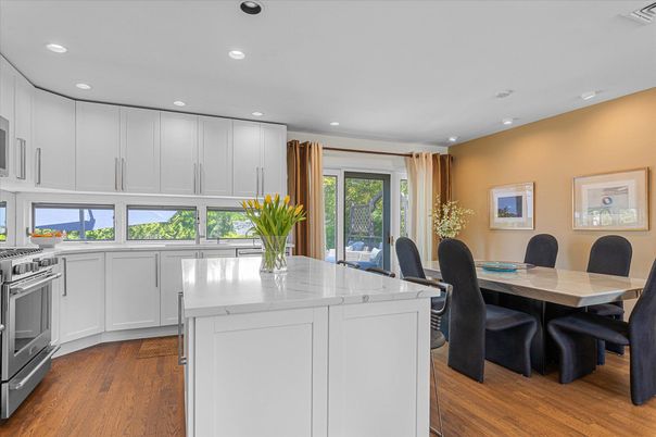 Dining room, Interior, Kitchen, Recessed Lighting, Stainless Steel Appliances, Wood Texture Flooring