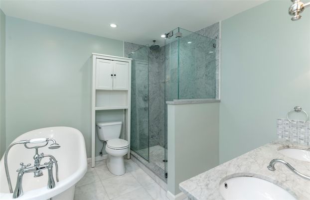 Bathroom, Dual Sink Vanities, Glass Shower, Interior, Marble Walls, Recessed Lighting