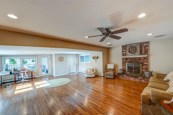 Fireplace, Home Office, Interior, Recessed Lighting, Stone Walls, Wood Texture Flooring