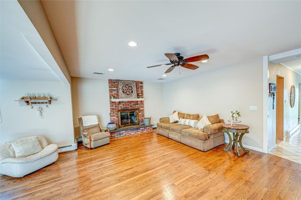 Fireplace, Interior, Living room, Recessed Lighting, Wood Texture Flooring