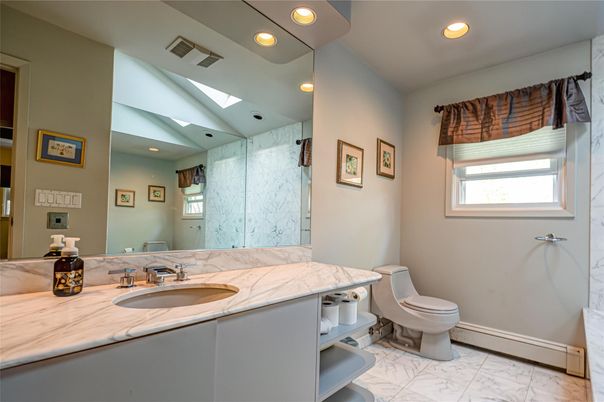 Bathroom, Dual Sink Vanities, Interior, Marble, Marble Walls, Recessed Lighting