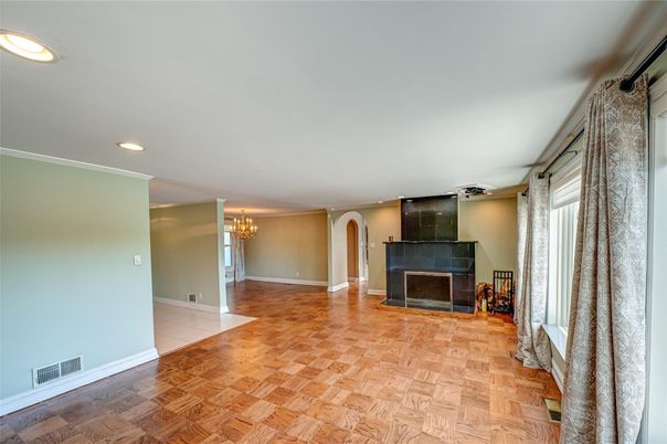 Chandelier, Empty room, Fireplace, Interior, Recessed Lighting, Wood Texture Flooring