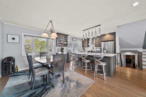Dining room, Interior, Kitchen, Pendant Lights, Recessed Lighting, Stainless Steel Appliances, Wood Texture Flooring