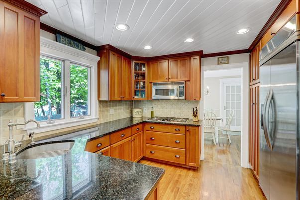 Dining room, Interior, Kitchen, Recessed Lighting, Stainless Steel Appliances, Wood Texture Flooring