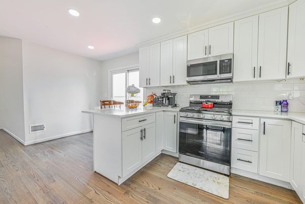 Interior, Kitchen, Recessed Lighting, Stainless Steel Appliances, Wood Texture Flooring
