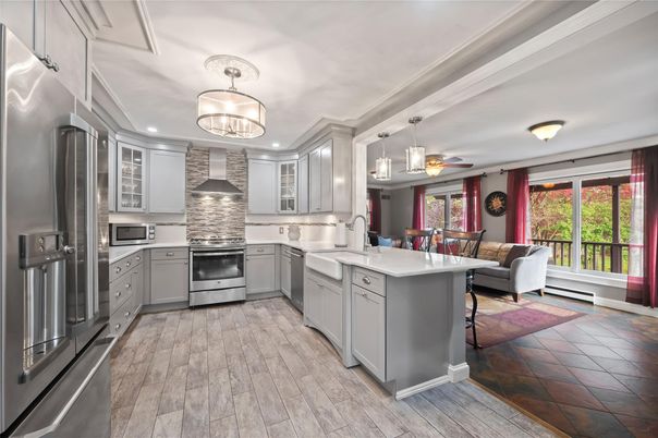 Dining room, Interior, Kitchen, Pendant Lights, Recessed Lighting, Stainless Steel Appliances, Wood Texture Flooring