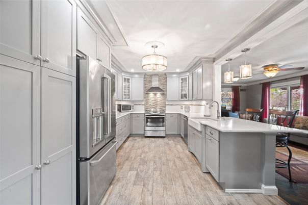 Dining room, Interior, Kitchen, Pendant Lights, Stainless Steel Appliances, Wood Texture Flooring