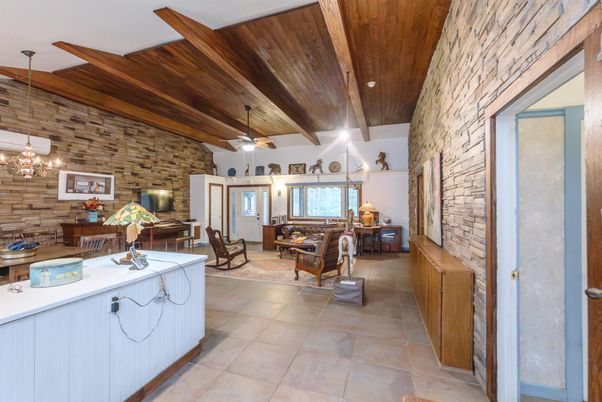 Chandelier, Dining room, Interior, Living room, Pendant Lights, Stone Walls, Wooden Beams, Wooden Ceilings