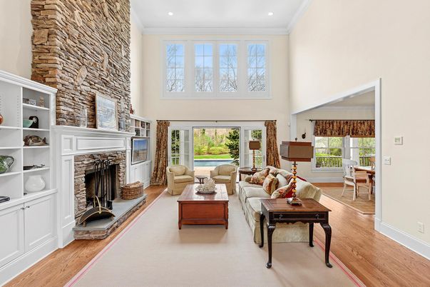 Fireplace, Interior, Living room, Recessed Lighting, Stone Walls, Wood Texture Flooring
