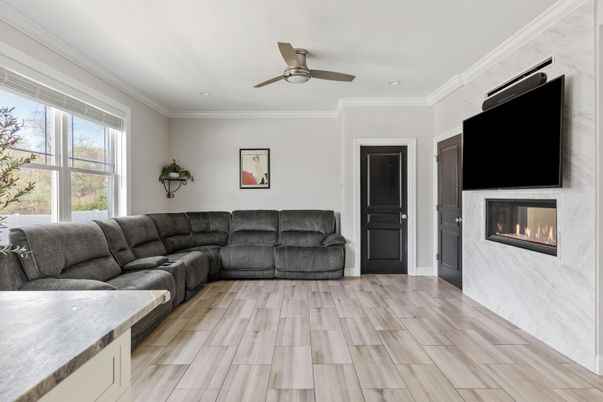 Fireplace, Interior, Living room, Recessed Lighting, Wood Texture Flooring
