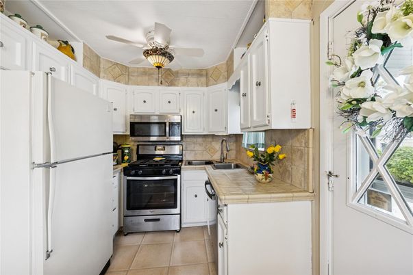 Interior, Kitchen, Stainless Steel Appliances, Tile Countertops
