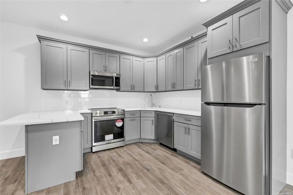 Interior, Kitchen, Recessed Lighting, Stainless Steel Appliances, Wood Texture Flooring