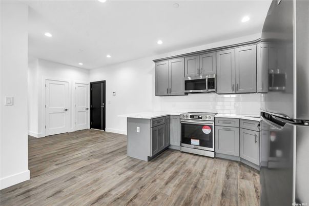 Interior, Kitchen, Recessed Lighting, Stainless Steel Appliances, Wood Texture Flooring