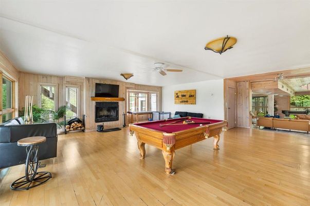 Billiard Table, Fireplace, Game Room, Interior, Living room, Wood Texture Flooring, Wooden Walls