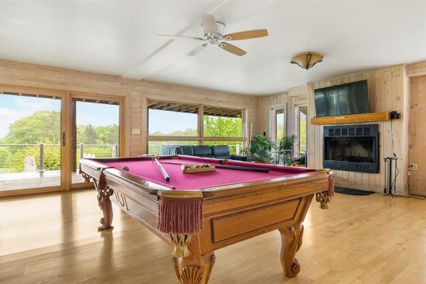 Billiard Table, Fireplace, Game Room, Interior, Wood Texture Flooring, Wooden Walls