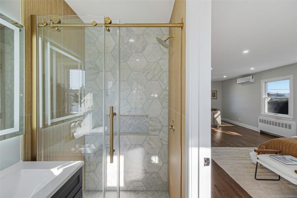 Bathroom, Glass Shower, Interior, Marble Walls, Recessed Lighting, Wood Texture Flooring
