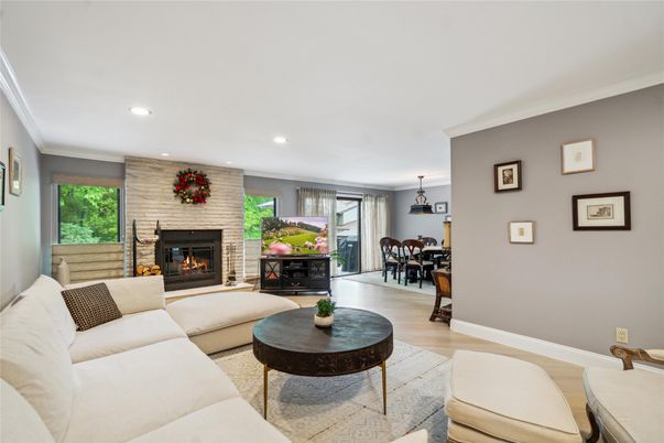 Dining room, Fireplace, Interior, Living room, Pendant Lights, Recessed Lighting, Stone Walls, Wood Texture Flooring