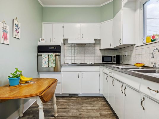 Interior, Kitchen, Stainless Steel Appliances, Tile Countertops, Wood Texture Flooring