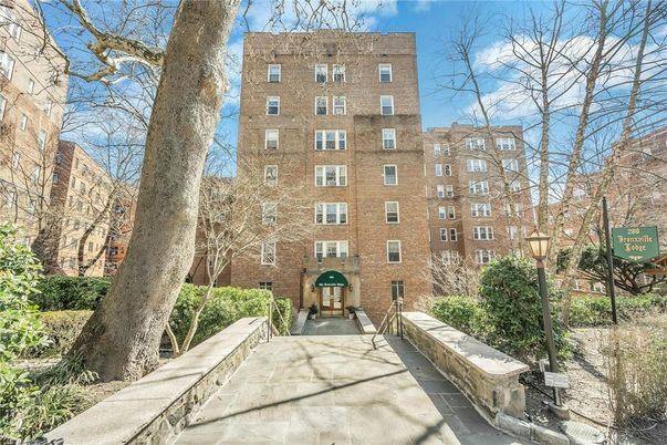 Exterior, Facade, Brick Facade, Condo Building